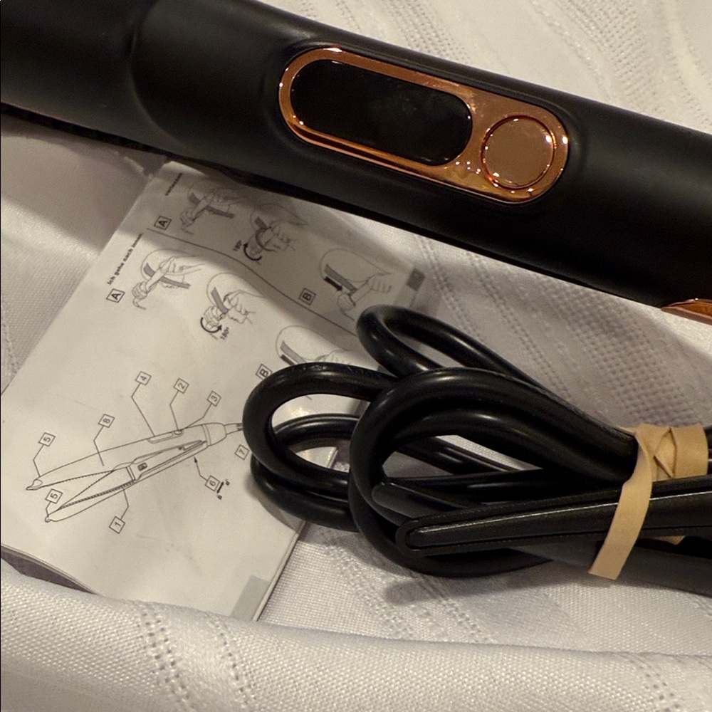 Image Black and Gold Hair Styling Tool